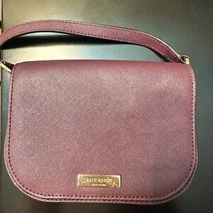 Purple Kate spade crossbody. Great condition. Minimally used.